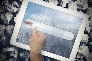 Hands touching search bar on tablet screen © vectorfusionart