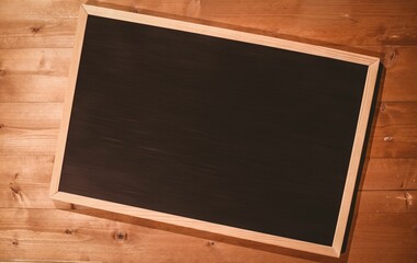 Small blackboard on wooden floor