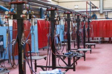 Empty assembly line in illuminated industry