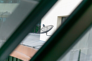 Satellite Dish on Building Exterior View