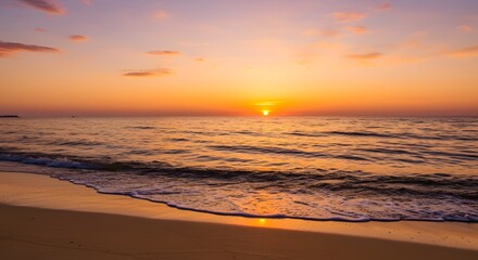 Gentle ocean waves lapping sandy coast at twilight