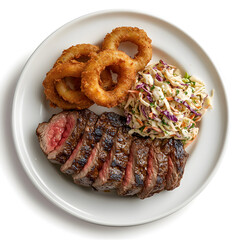 Grilled steak with crispy onion rings and coleslaw, plated and isolated on white background.