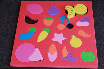 Fruit shape template for toddlers and kids on playground isolated on dark background.