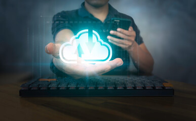 Cloud computing concept. Man using smartphone with cloud technology and data management symbol on palm. Suitable for technology and IT theme.