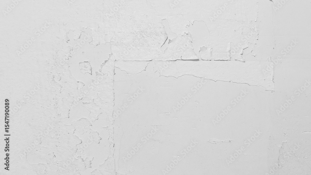 Poster close up view of a distressed white concrete wall with cracking and peeling paint, creating a textur