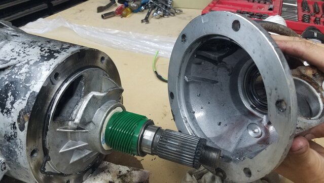 Gears, Mechanic Work, Installing a Slip Yoke Eliminator on a 4x4 Vehicle - Powered by Adobe