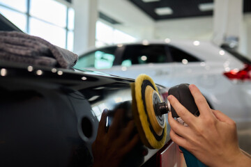 A Detailed Close Up of the Car Polishing Process in the Field of Automotive Detailing