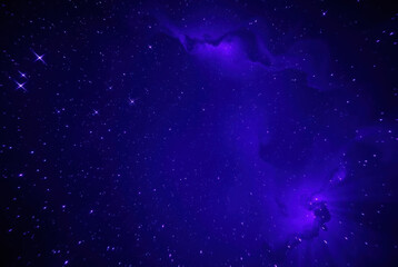 Abstract purple nebula. Stars in background. Beautiful space themed design.