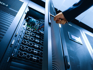 Hand Opening Server Rack Door in Data Center