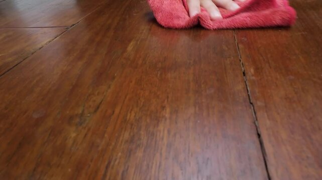 Brown Wooden Floor With Visible Grain and Seams