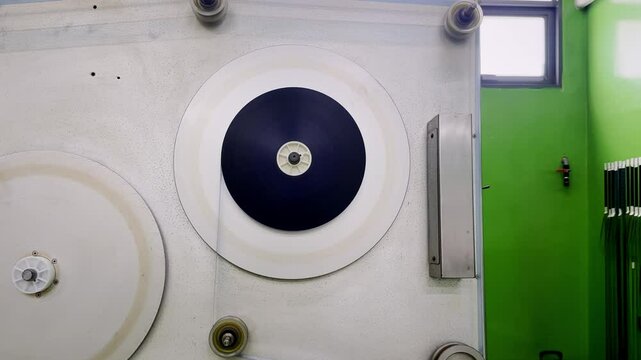 A movia film was running then the take up  in the reel,  film developement process.