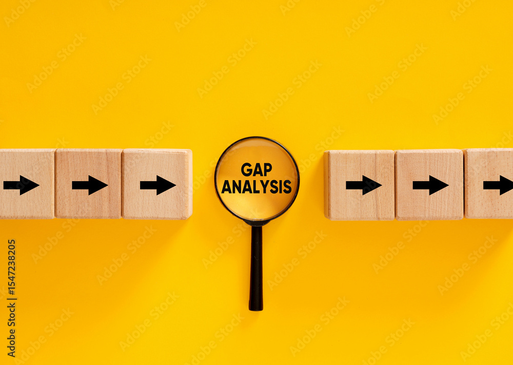 Poster magnifying glass focusing on gap analysis between two sets of wooden blocks with arrows pointing rig