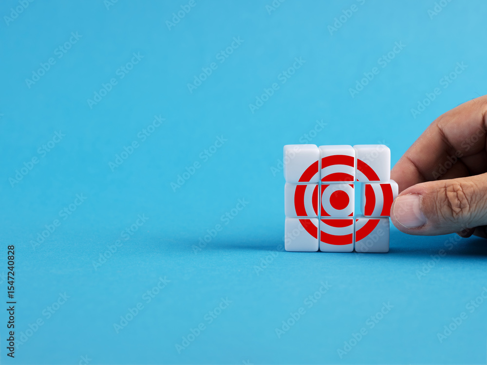Poster businessman completing target objective combining puzzle pieces