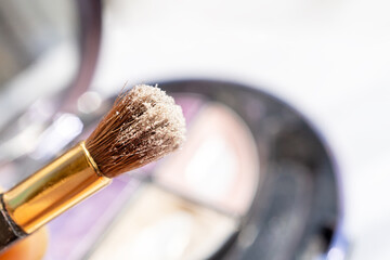 Brush blush eyeshadow palette background. Eyeshadow palette, eyeshadow cosmetic product as luxury...