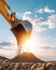 Modern Construction Site with Excavator Bucket Dumping Earth in Golden Hour Light - Sustainable Building and Infrastructure Development