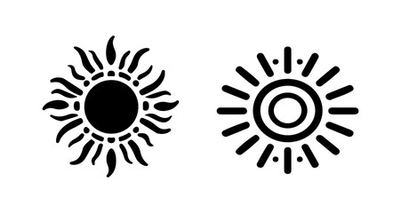 Fototapeta premium Two sun icons with different designs showcasing radiant beams and circular forms in a simple black and white style