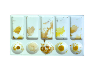 Palette with paints isolated on white background.
