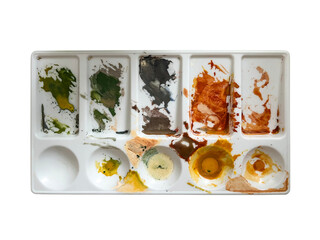 Palette with paints isolated on white background.
