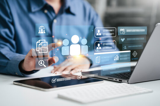 HR human resources management concept. Businessman touch digital icons of people and team management. recruitment, employee data, business leadership, and digital HR solutions.