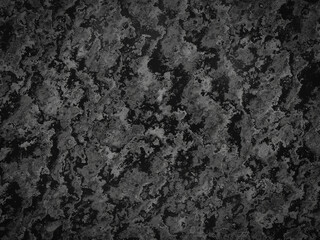 Smooth dark marble with light gray veins, offering a luxurious and timeless appearance.
