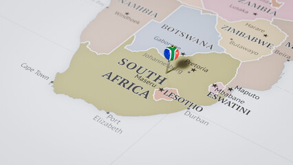Fototapeta premium A Map of South Africa, with a Pin Featuring the South African Flag