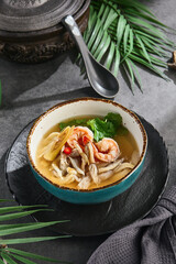 Chinese hot and sour seafood soup, bright lighting, overhead presentation with rustic accents