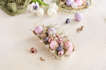 Easter eggs pastel colored, rustic lighting, overhead composition, straw arrangement, natural accents