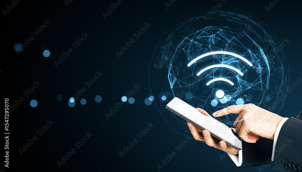 Aufkleber Businessman using a digital tablet to access wireless internet through a futuristic interface with glowing wifi symbol on dark tech background.