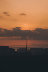 Naklejka premium sunset over the city