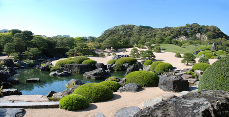 A huge japanese garden in art museum under the sunshine /...