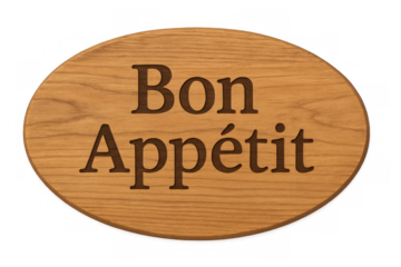 Oval wooden sign showing bon appétit on transparent background