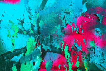 Vibrant abstract wall texture in neon turquoise,pink with distressed look.Retro 80s...