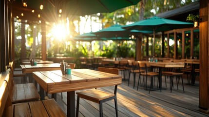 Fototapeta premium A beautifully designed outdoor restaurant bathed in natural light, creating an inviting atmosphere that encourages social gatherings and relaxation among patrons.