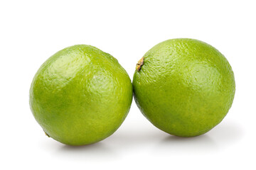 
Two lime fruits of beautiful lime color isolated on white background

