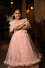 Portrait of indian cute little girl indoors