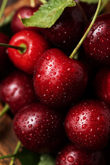 Close-up of juicy cherries or sweet cherries with water droplets. Summer berries and fruits. Macro food photography