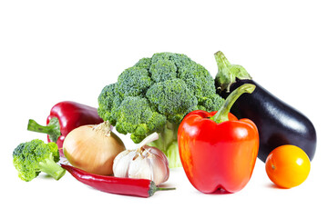 Fresh shiny multicolored vegetables isolated on white background.