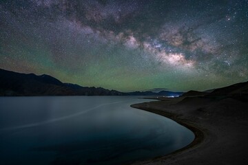 Above the Earth, Beneath the Stars -Milky Way Rising over Pangong Tso – Merak Village, Approximately 4275m above sea level © Ernie.Imagery