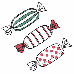 Three delicious wrapped candies isolated on white background