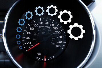 A concentric pattern of gears changing color from blue to white around the numbers on the...