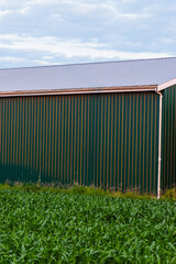 Sunset on the side of a barn