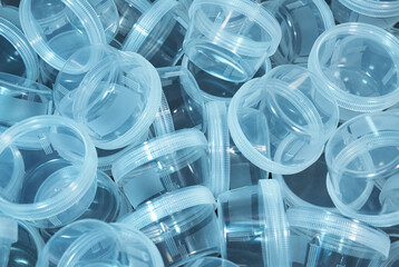Transparent plastic containers for collecting biological fluids for clinical analysis