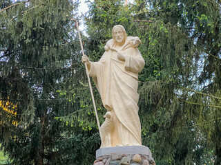 A figure of Jesus the Good Shepherd in the garden at the Minor Basilica of Our Lady of Listening...