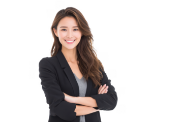 A confident young woman in a black blazer and gray top stands with arms crossed. smiling warmly against a plain white background. suggesting professionalism and approachability for business contexts