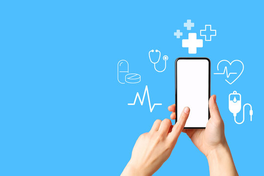 A hand interacts with a smartphone displaying health-related icons on a blue background - Powered by Adobe