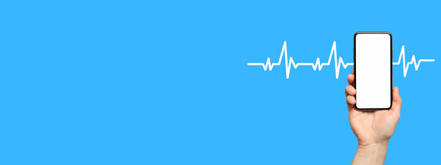 Hand holding a smartphone showing health metrics on a blue background with heartbeat