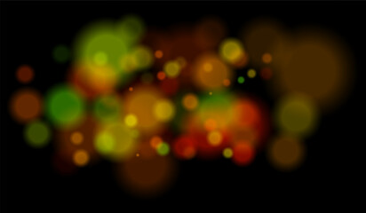 Blurred particles with mixed color tones forming soft bokeh field. Abstract glowing circles on black background for dreamy effects.