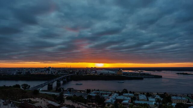 A stunning sunset 4K time-lapse capturing the famous view of the arrow in Nizhny Novgorod, where the Oka River flows into the mighty Volga