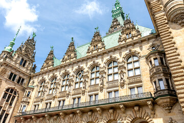 Historic European architecture. Ornate facade. Green spires