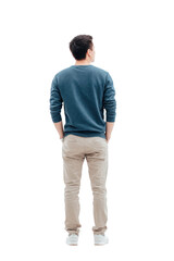 Fototapeta premium A young man stands with his back to the camera. dressed casually in a blue sweater and beige pants. in a minimalistic white studio. contemplating his next steps in a serene environment